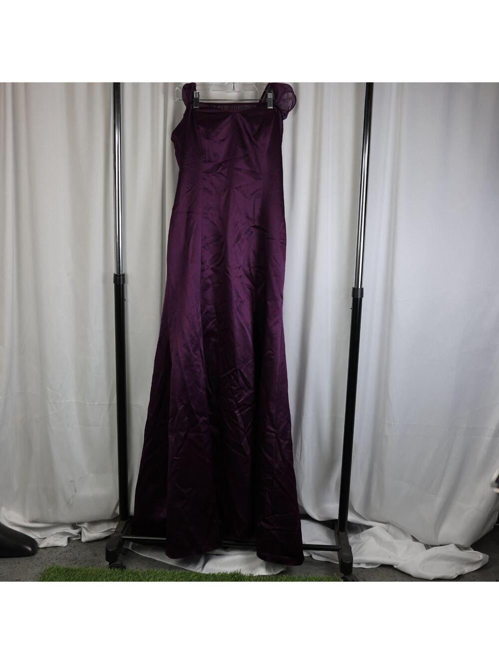 Dessy Collection aubergine floor-length gown.